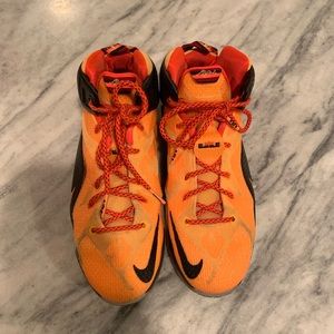 orange nike men’s lebron 12